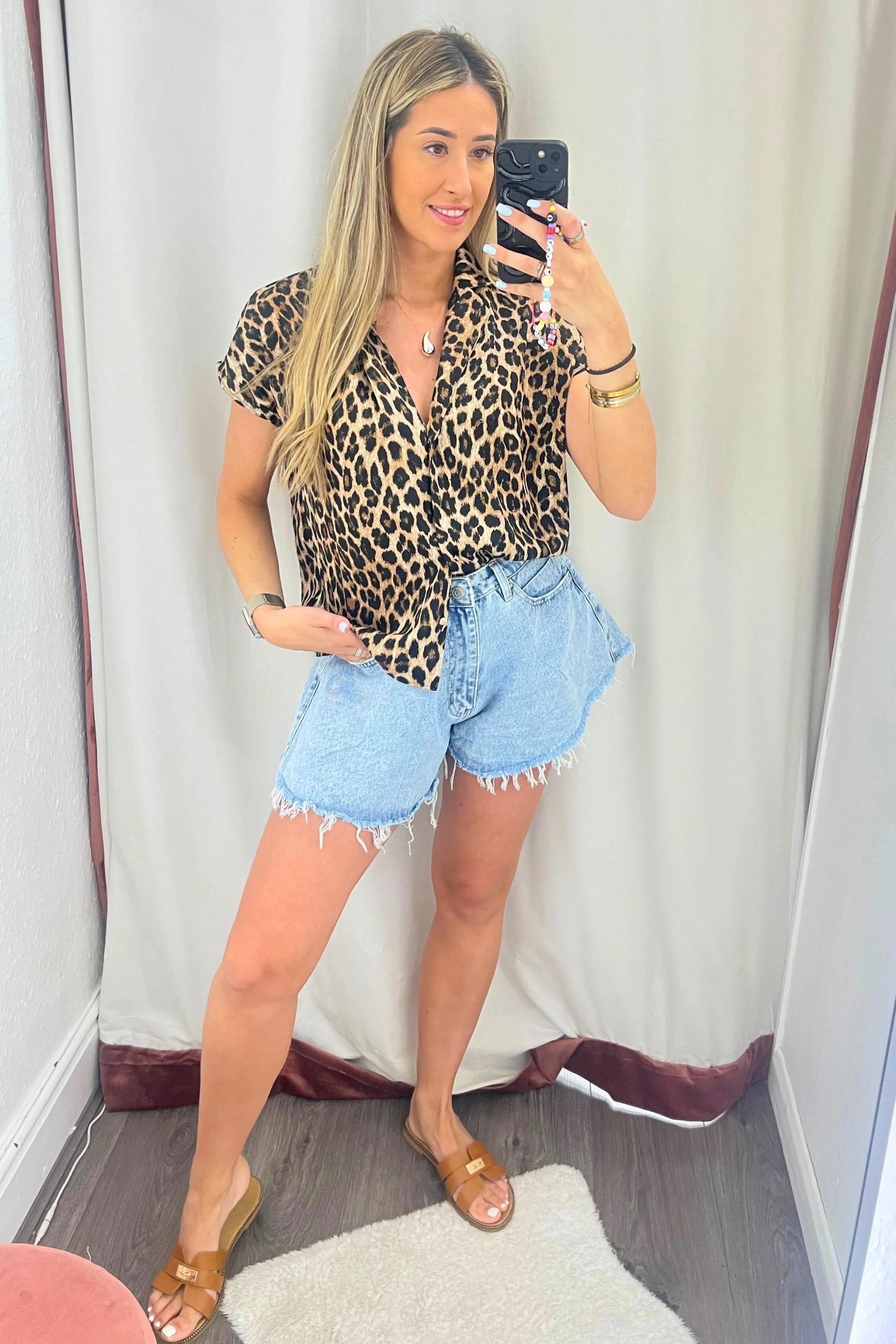 Leopard print short sleeved button up shirt