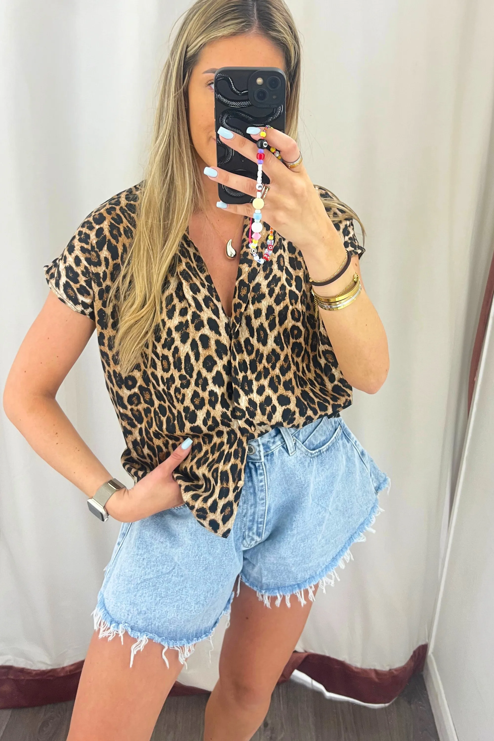 Leopard print short sleeved button up shirt